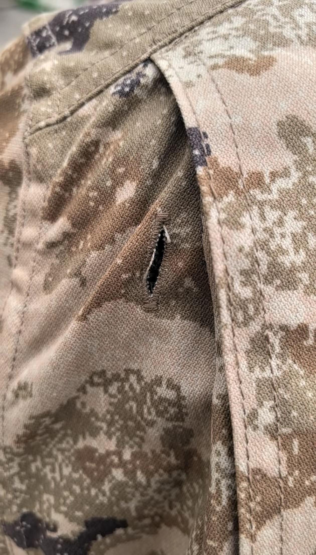 21式背后的纽扣孔是干嘛的？