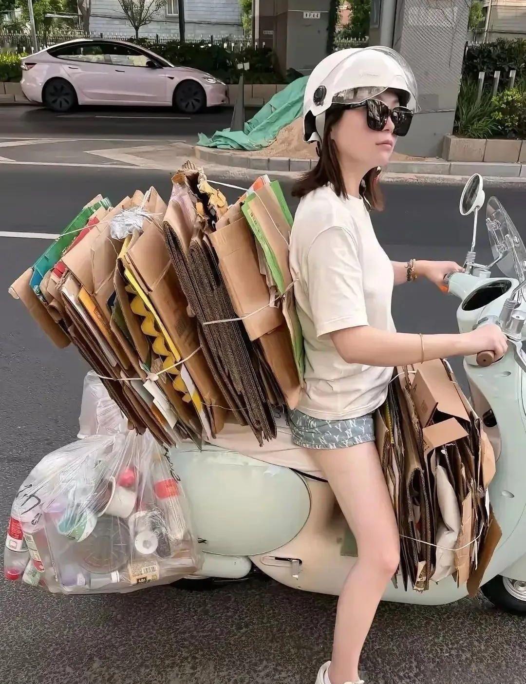 你们猜猜看，姑娘是收废品的