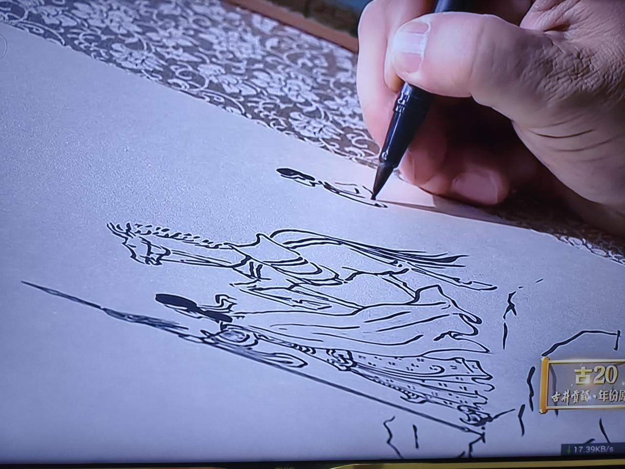 我最喜欢看《诗词大会》里的“画中有诗”了。康震老师好似神笔马良，提笔就画，分分钟