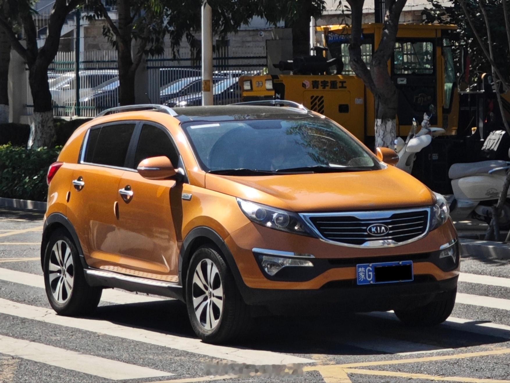 第三代起亚智跑(Sportage SL)，罕见的霞光橙。起亚智跑韩系车(现代ix