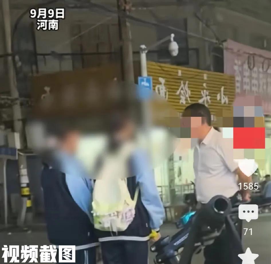 河南有位高中老师晚上外出。

突然看到穿着自家学校校服的两位女生在和几个不三不四