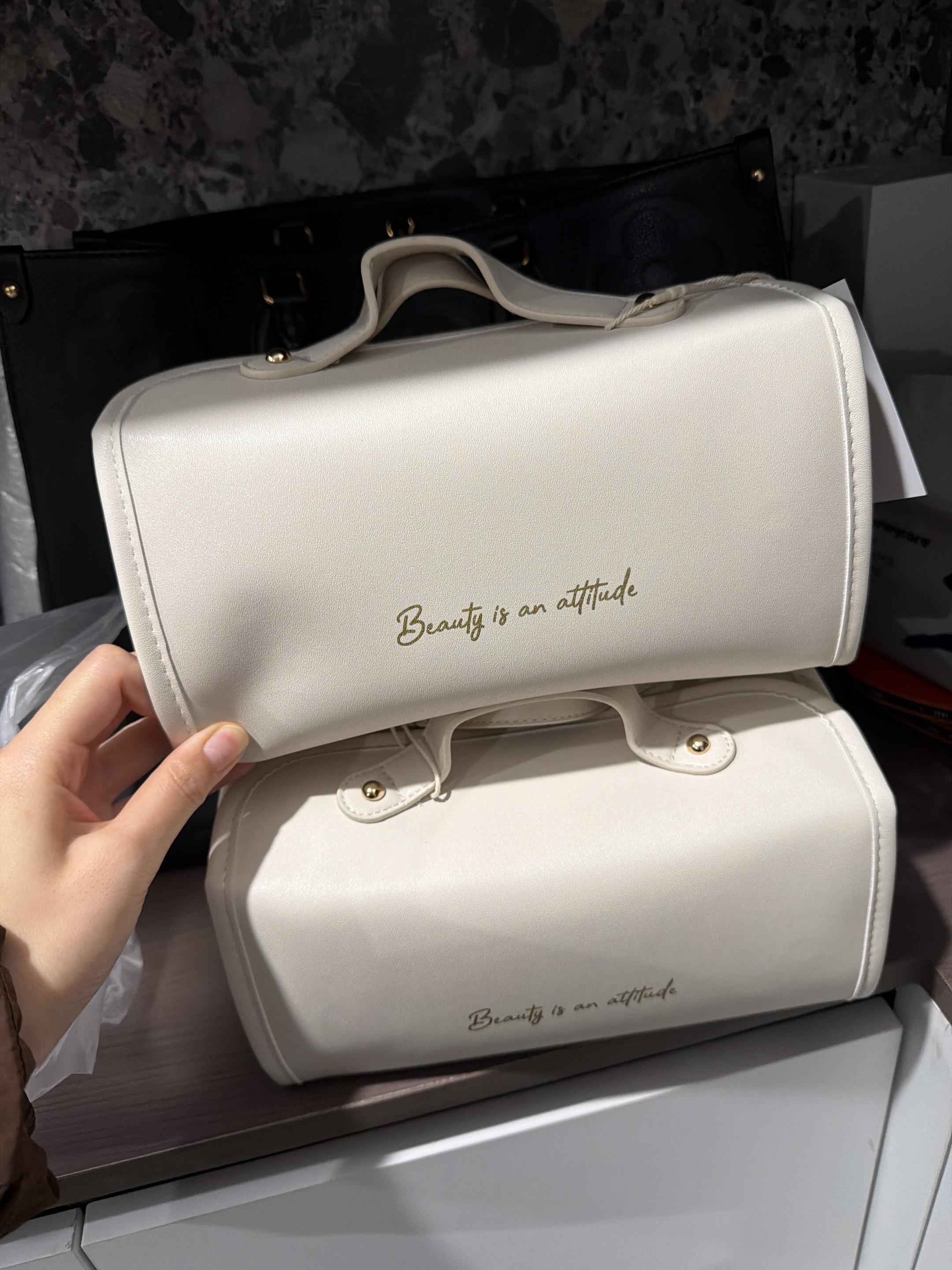 事情是 我先买了这个257的化妆包。 结果tb给我推了个59的 我以为...