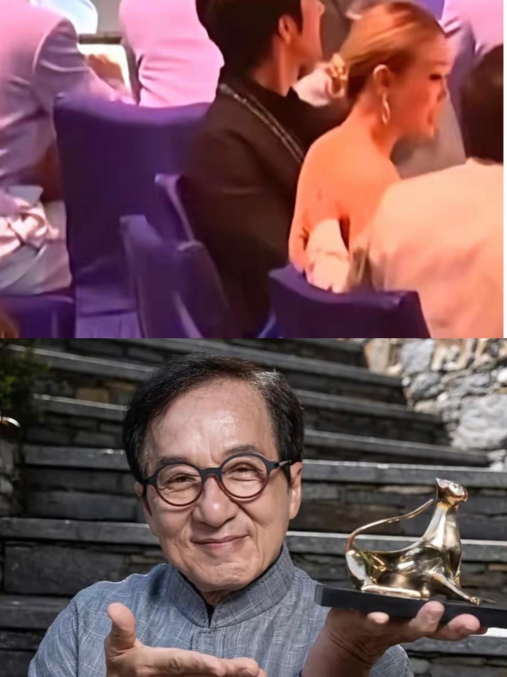 成龙在大湾区晚会上对着穿露背装的容祖儿拍了后背，这一举动引发网友热议！

据悉，