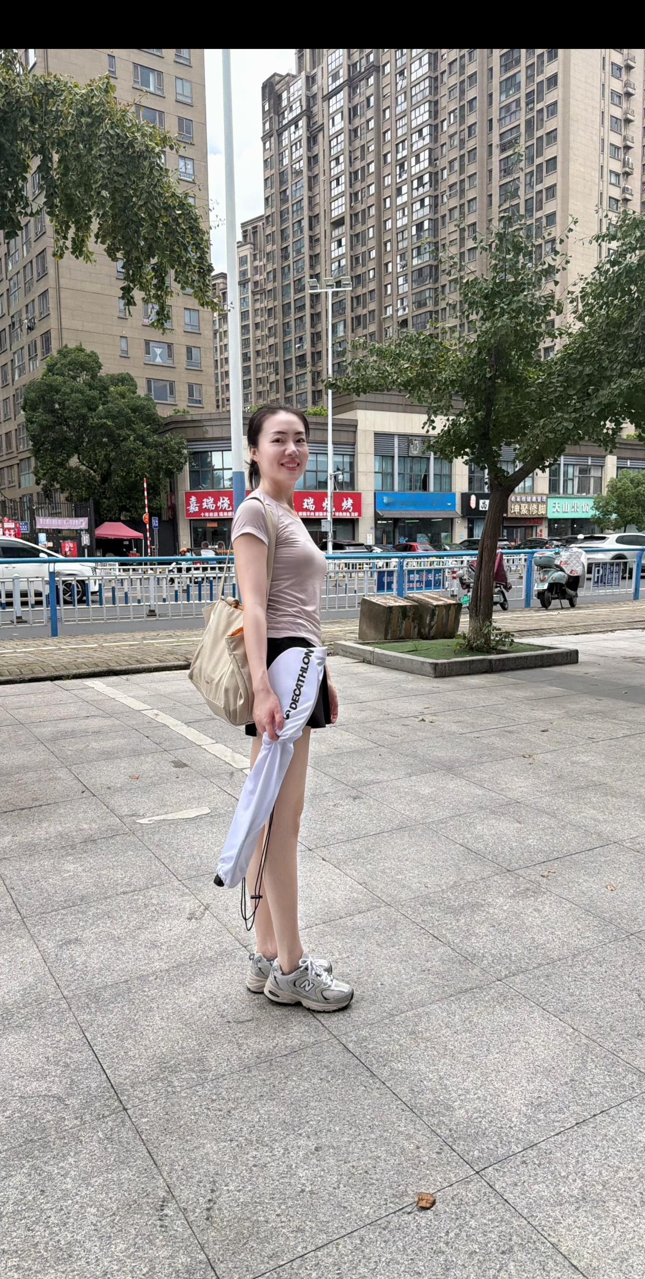 🏸