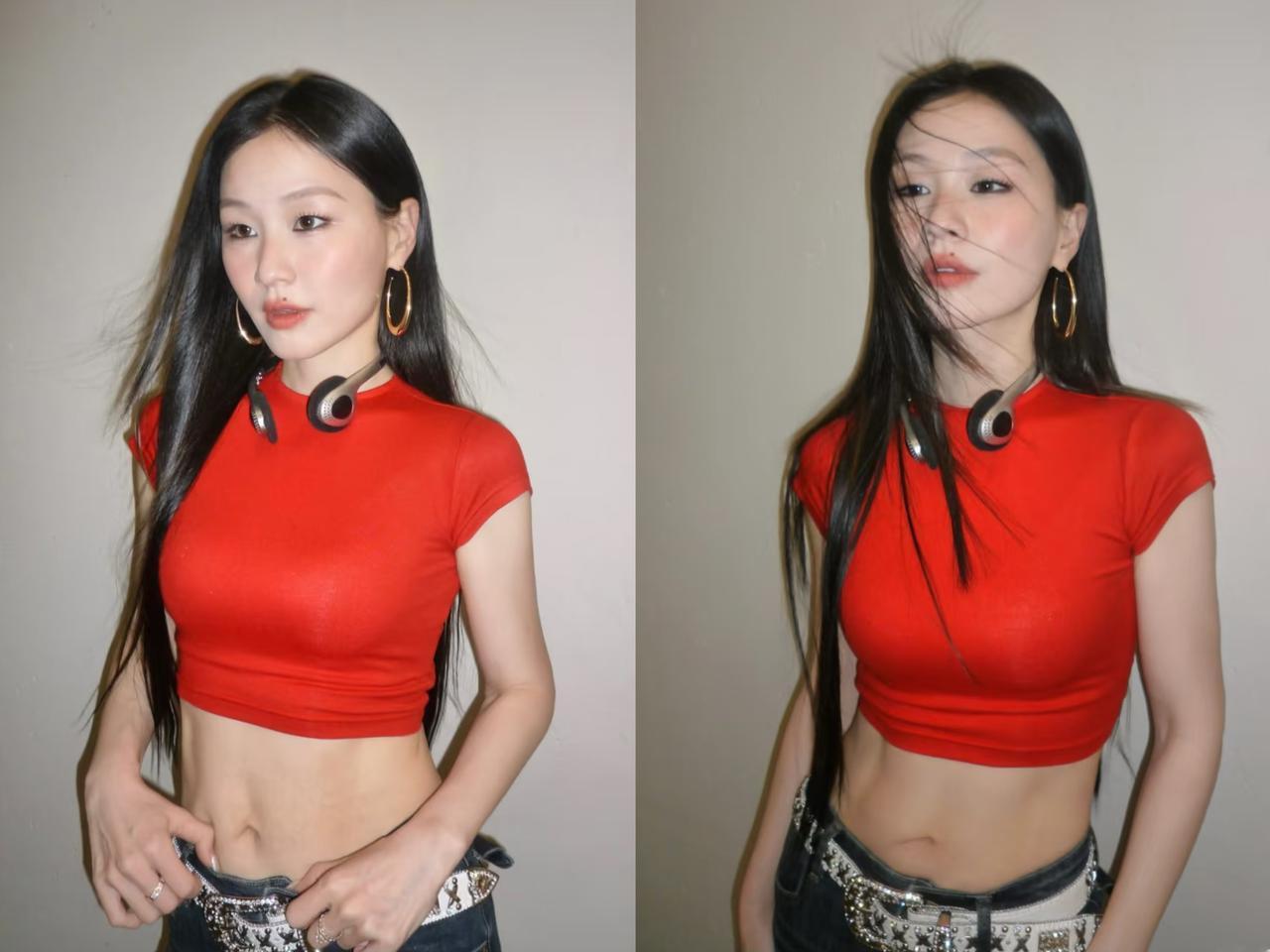 金婧这人还挺神奇的。
虽说她长相不算那种传统意义上的漂亮，
可往那一站，就是
