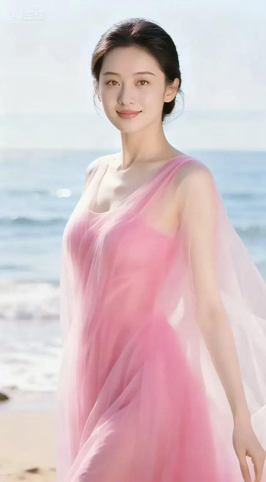 海边俏佳人 
 粉袂轻扬映海光，
沙滩漫步韵悠扬。
嫣然一笑含清韵，
半是温柔半