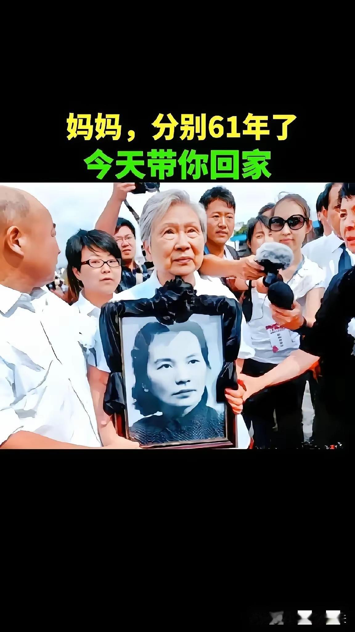 白发苍苍的女儿朱晓枫抱着母亲朱枫的遗像站在宁波栎社机场停机坪上时，指尖因用力攥着