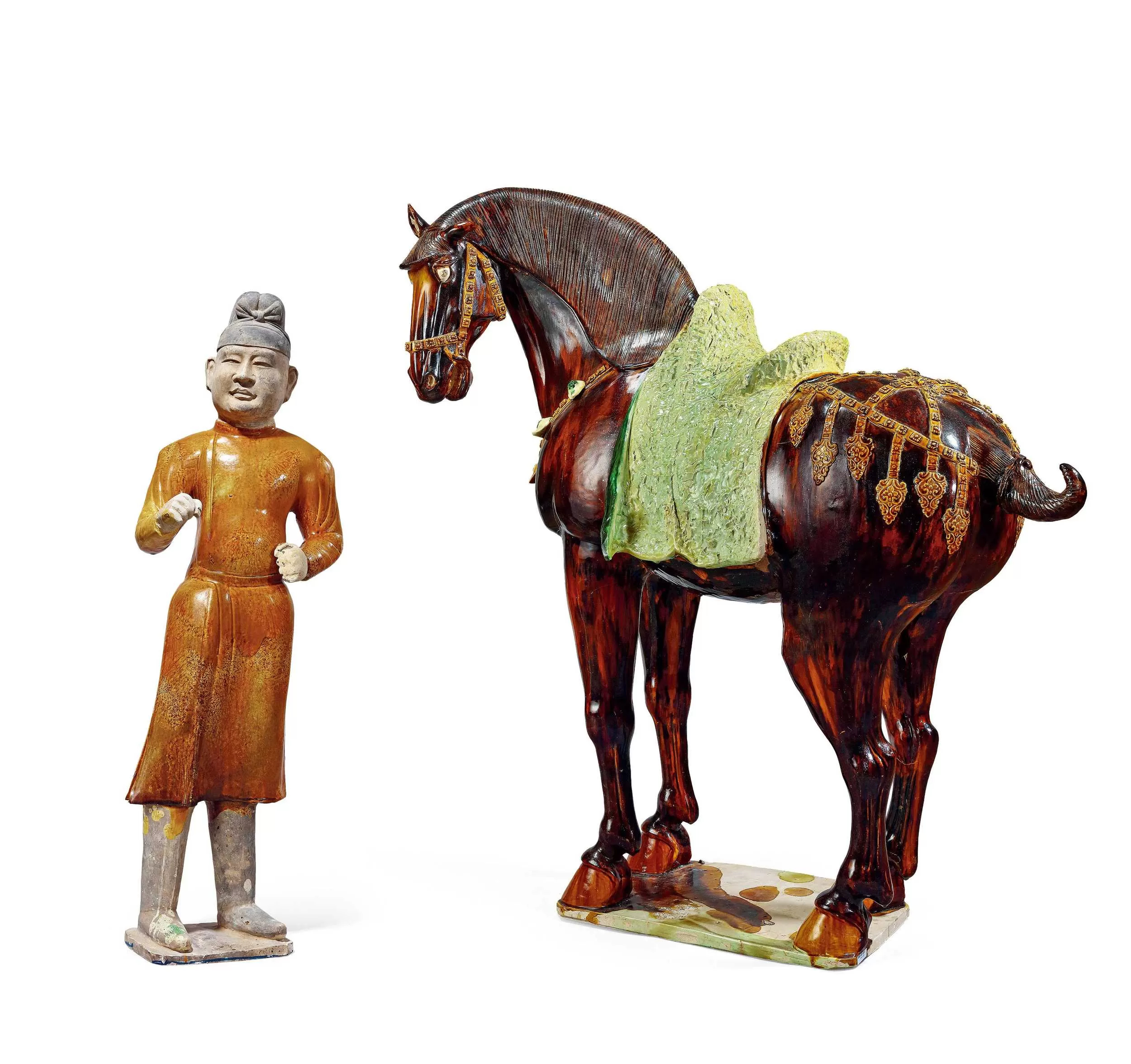 保利香港2026春拍上拍 香港徐氏艺术馆旧藏的 唐代黑褐釉三彩马和黄釉牵马俑 