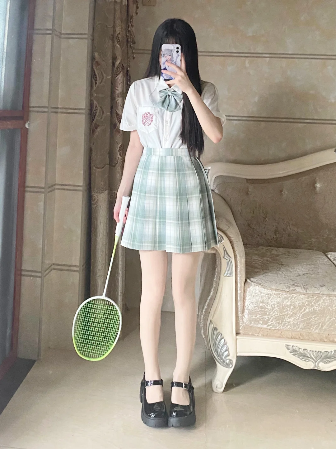 绿色jk和羽毛球