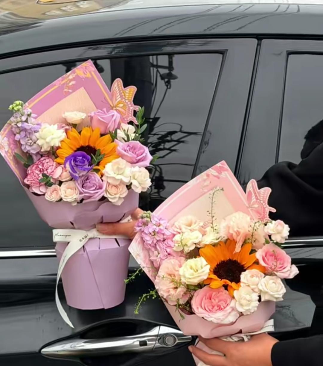 你问我答拍到的这个画面，鲜花配豪车，你们觉得这个鲜花是送给情人的，还是为教师节准