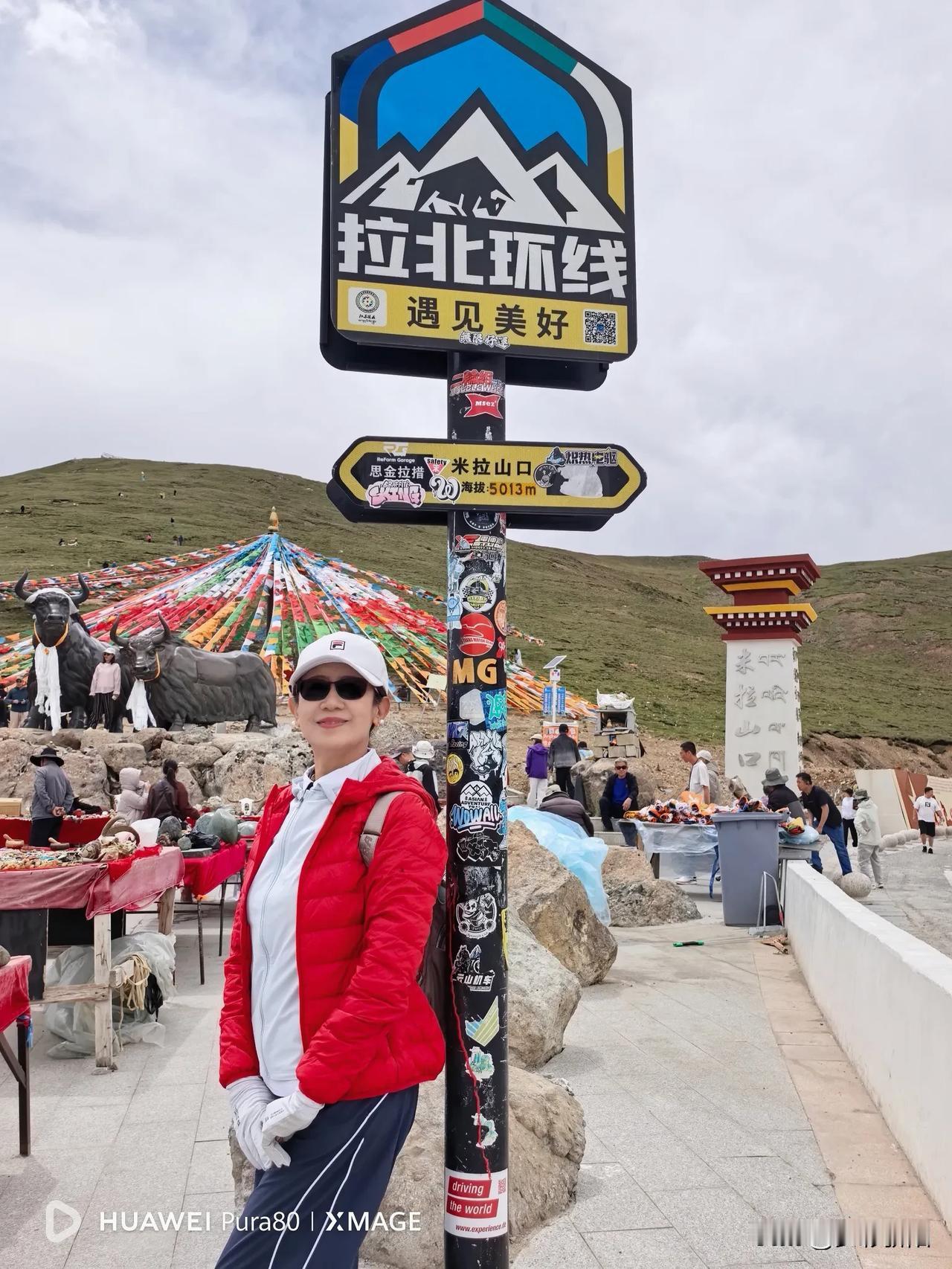 立于高原山口，迎风眺望，满心激动豁然开朗。翻过米拉山，释怀过往忐忑，藏地之行，不
