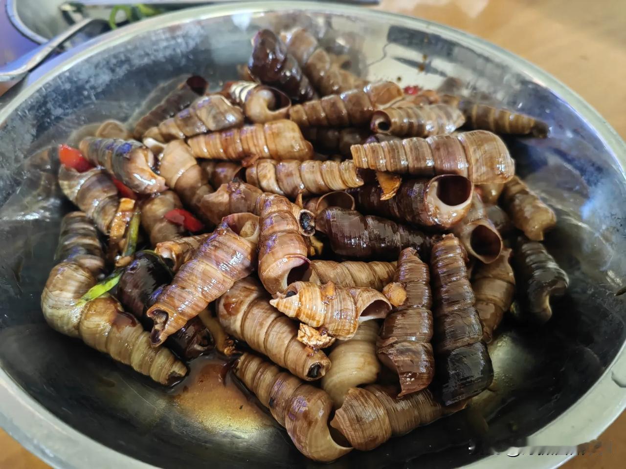 美食分享在湛江雷州吃夜宵，你不可能不点一盘炒钉螺！