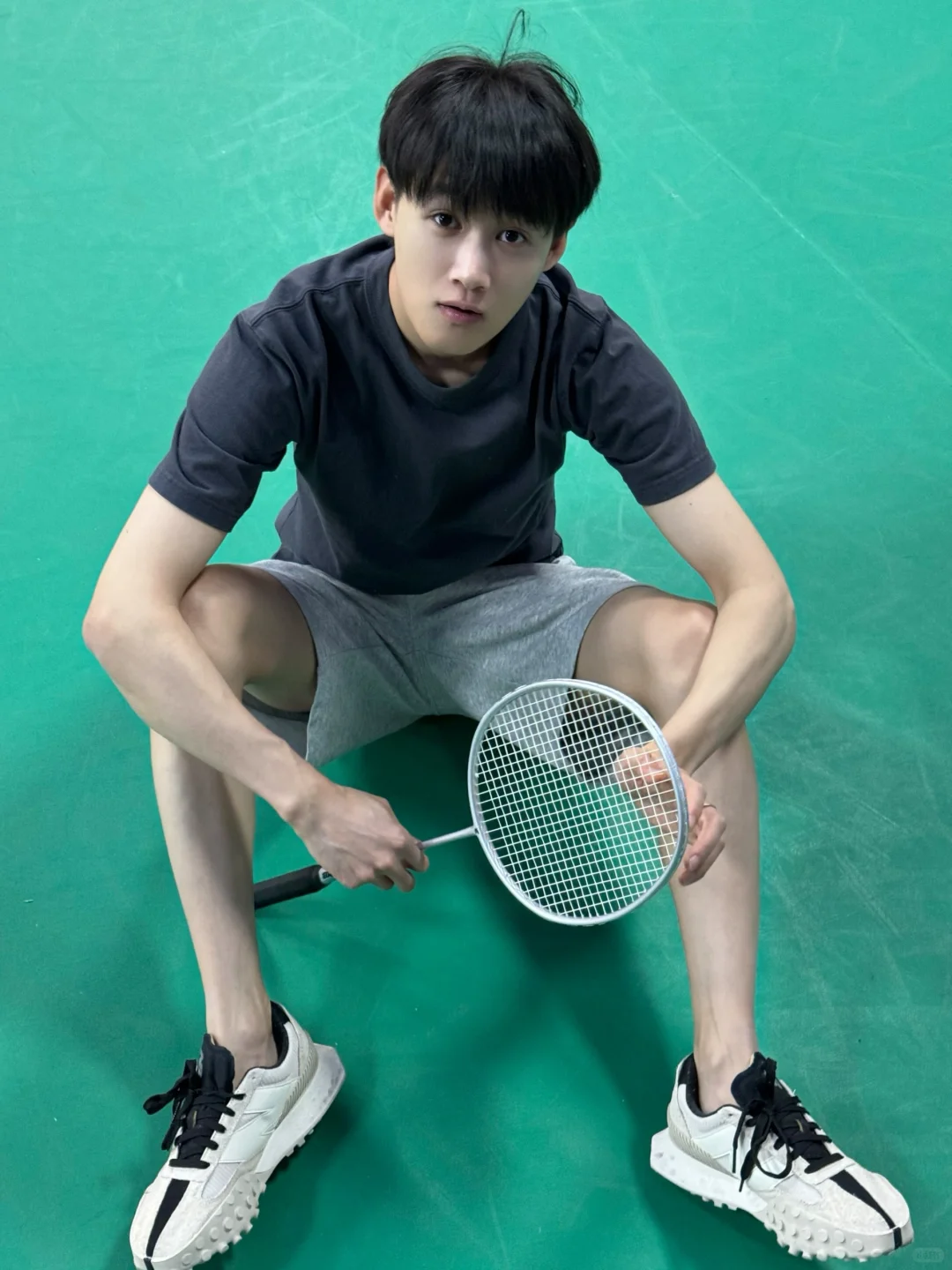 🏸