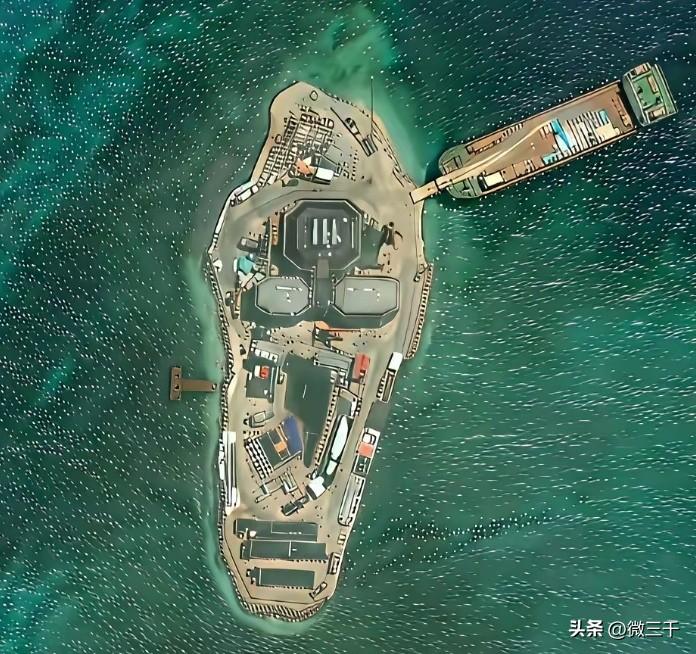 1张西沙群岛鸭公岛的卫星俯视图（图1），嘿嘿，与之前（图2）相比，上面的确添加了