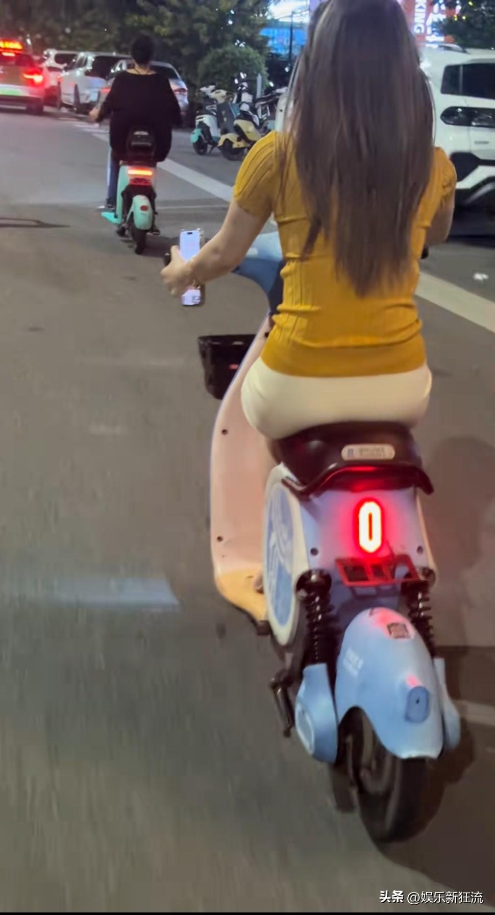 现代女性骑共享电动车出门实在太方便了，指哪儿打哪儿，跟着她一路了，这一路上从她那