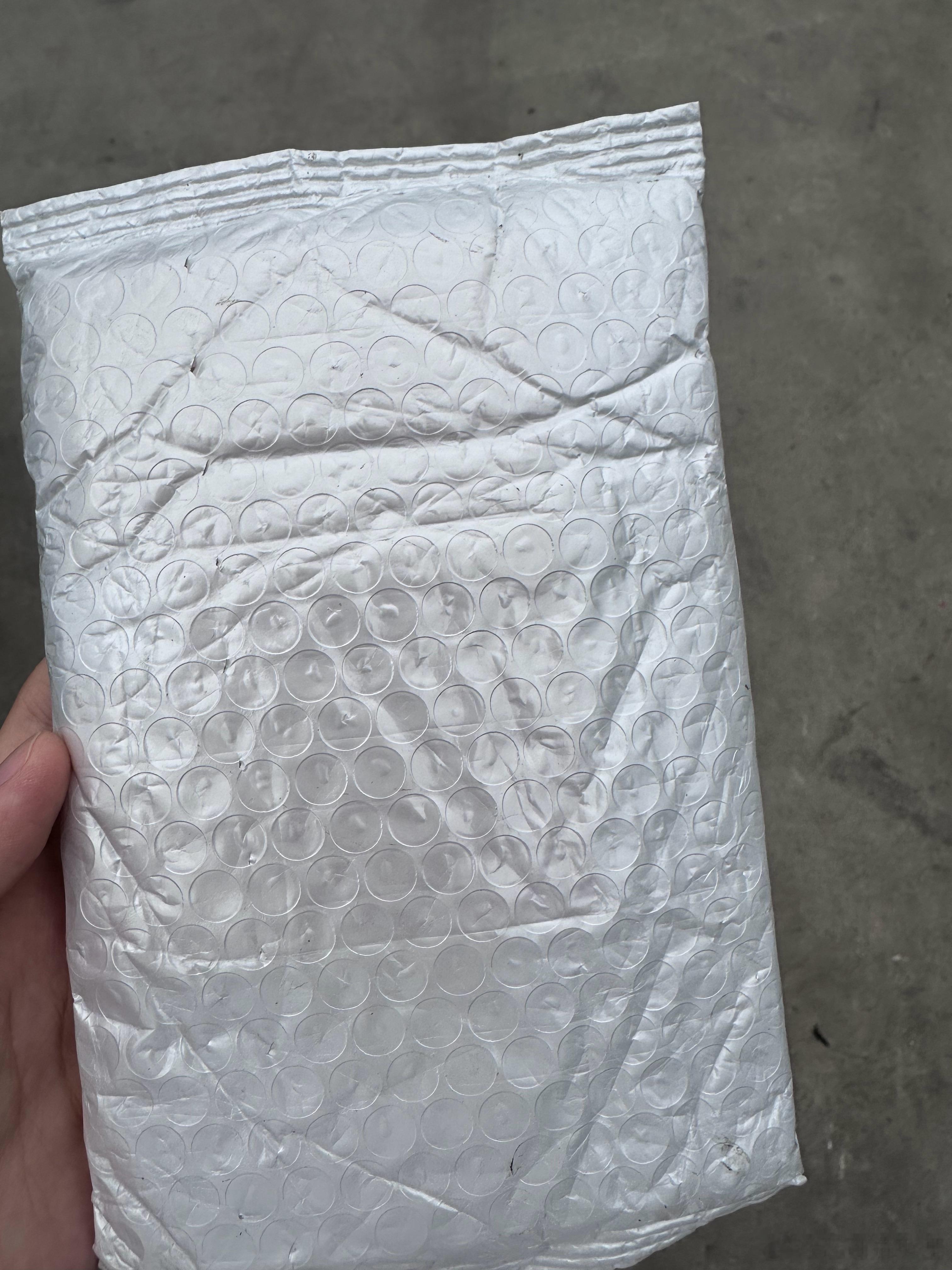 拿到之后我就知道这一份没有亲签了