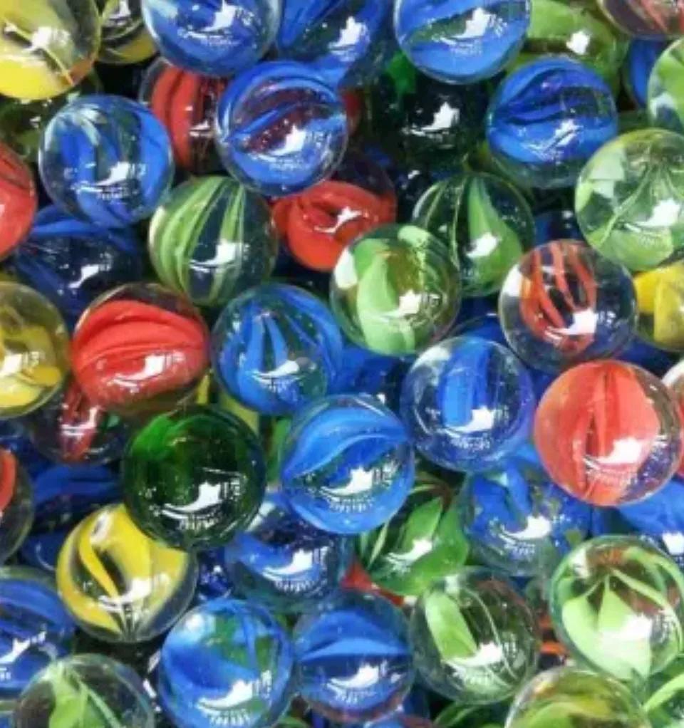 小时候玩玻璃球，我赢了一麻袋，玩这个我最拿手了，如果这个项目能进奥运会，我也能拿