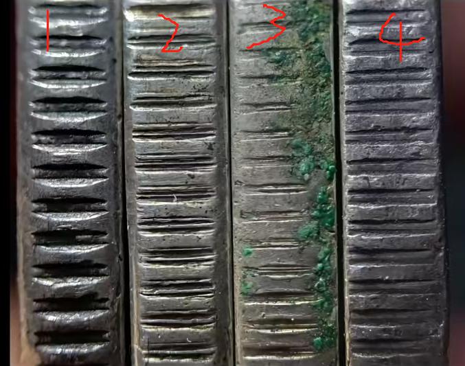 这四枚银元边齿当中，有两枚真币，两枚假币，你能把他们区分出来吗。
重点提示：真币