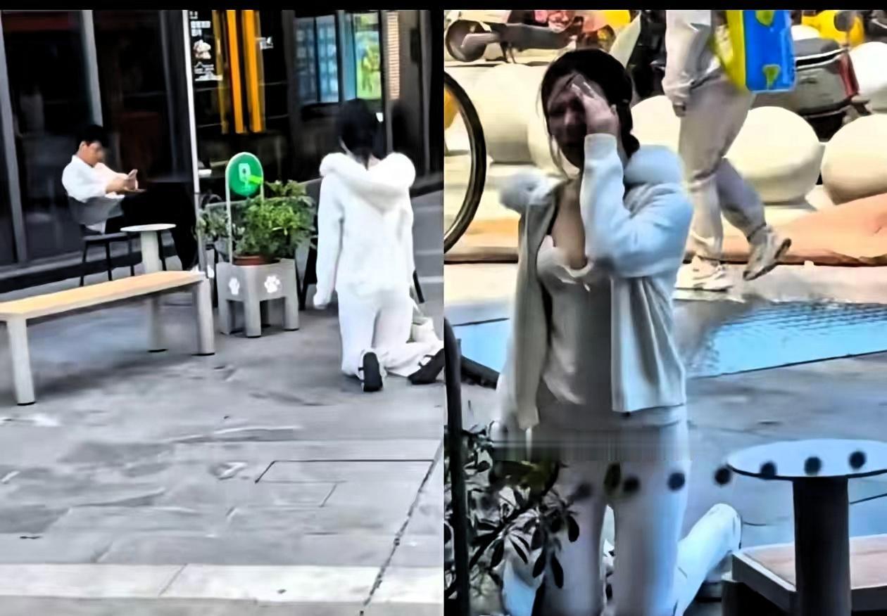 上海，5月16日，一个有些袒胸露乳的年轻姑娘，当街跪在一个男子面前，男子坐椅子上