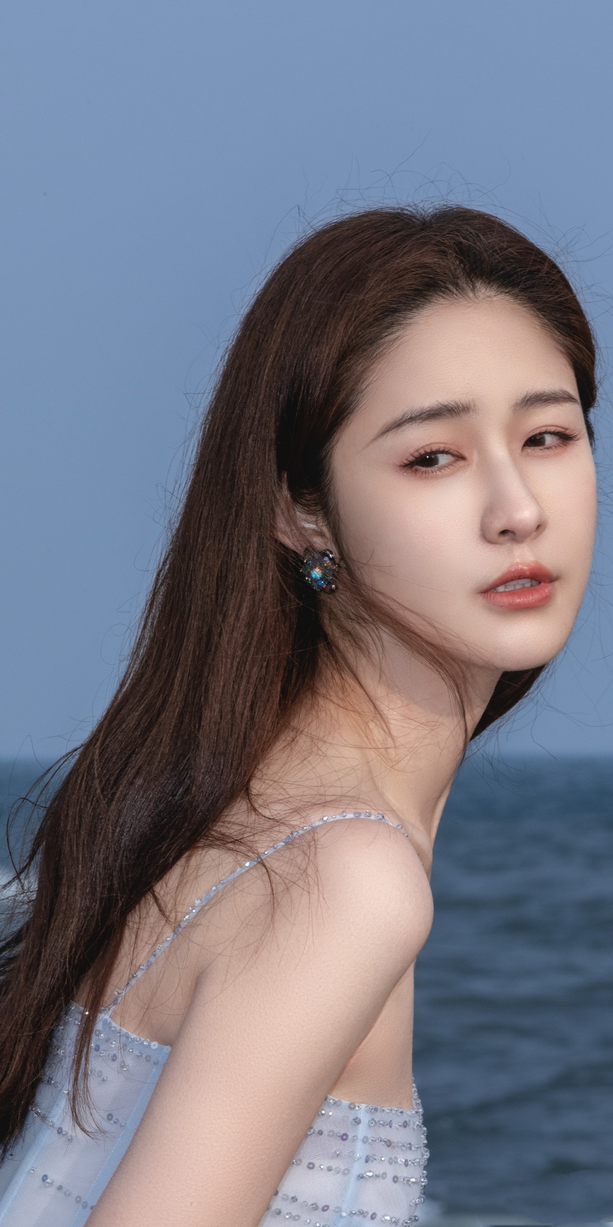 梁田壁纸：海边蓝色美人鱼。梁田
