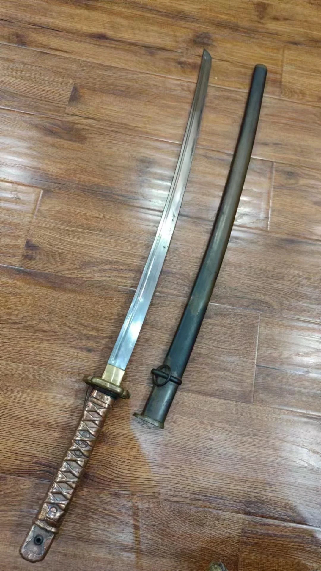 本馆藏品：侵华日军实物罪证早期铜柄95式