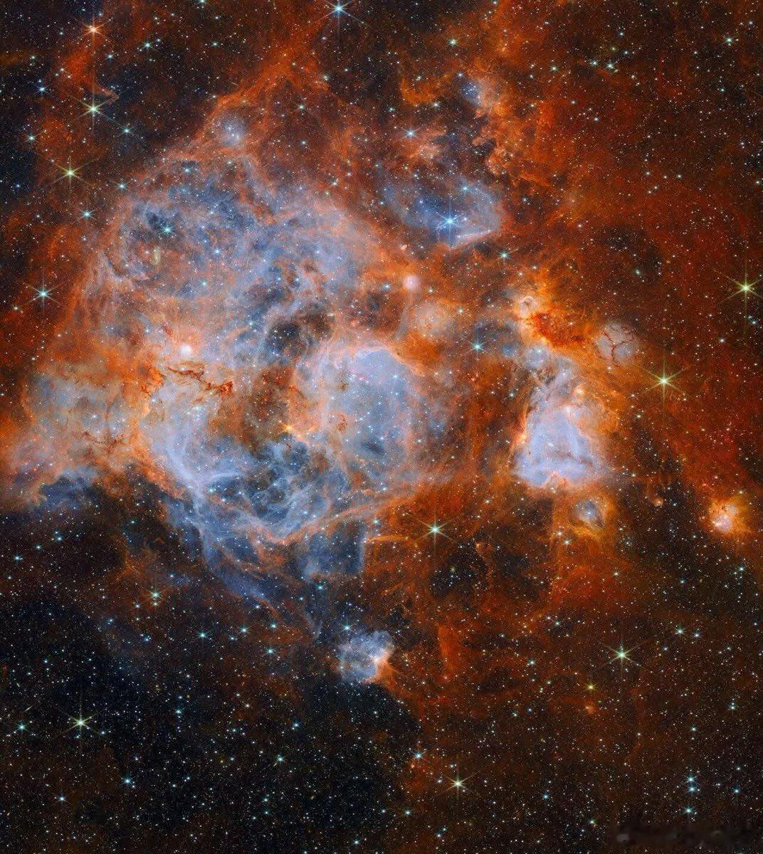 N159：宇宙大锅中酝酿的星辰踏入詹姆斯·韦伯太空望远镜捕捉到的动荡星辰诞生大锅