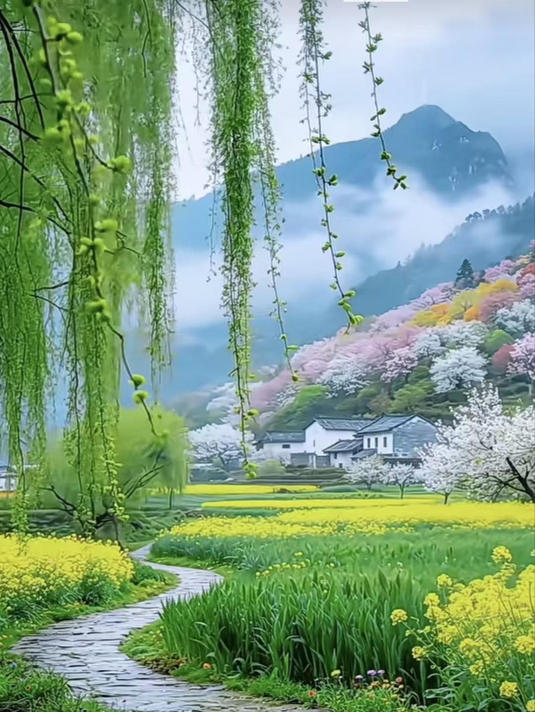 春景
春风送暖入屠苏，
岸柳轻摇翠影疏。
遍野金黄花似海，
桃源春色满归途。