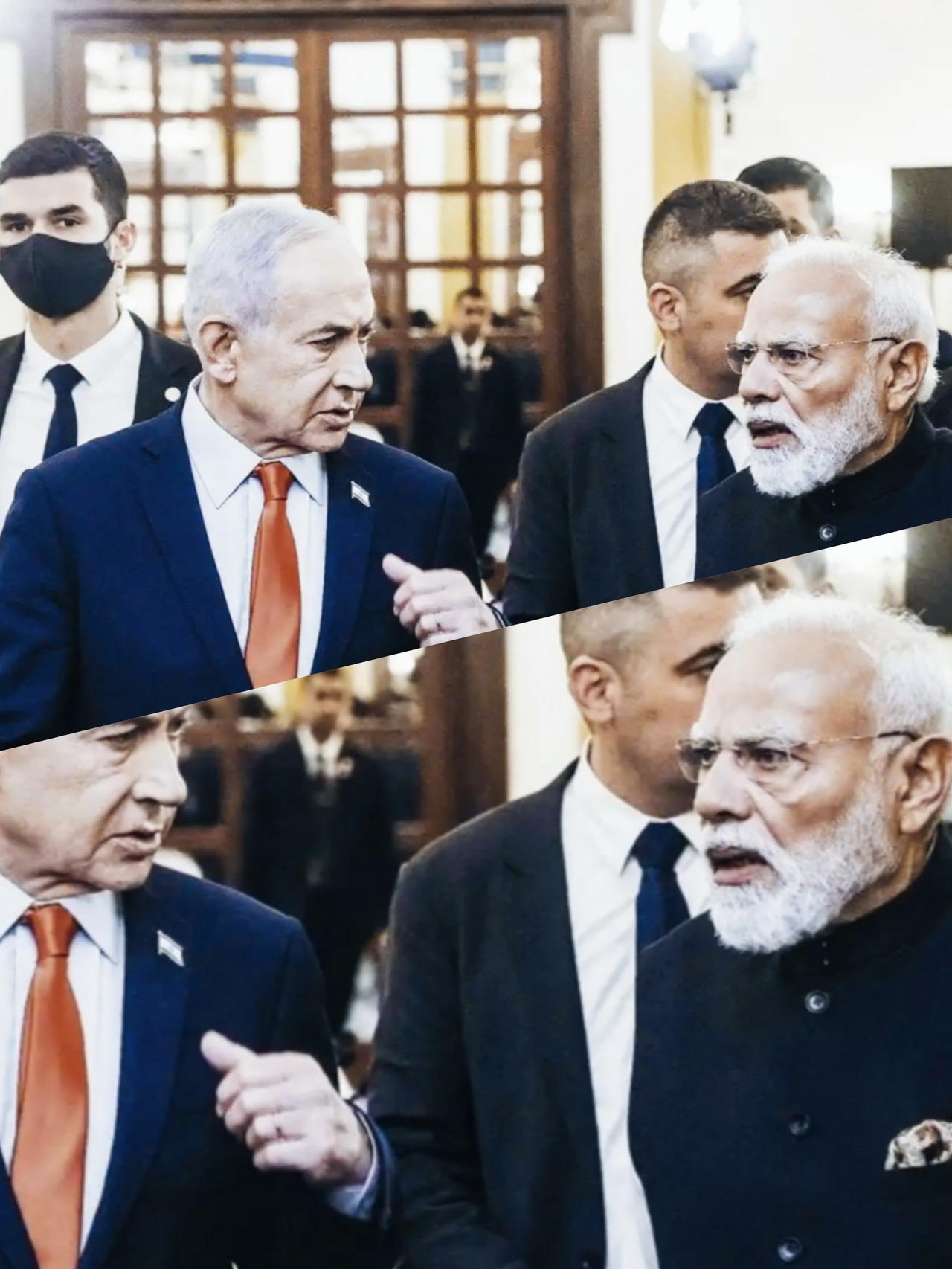 莫迪和内塔尼亚胡交流时，面部表情挺有特点啊！
莫迪的面部表情是什么意思呢？是一脸