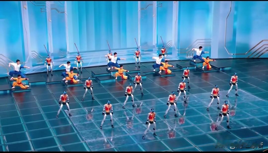 武林高手当属春晚机器人。

看机器人表演中国功夫，一个了不起的点是翻跟头能站住，