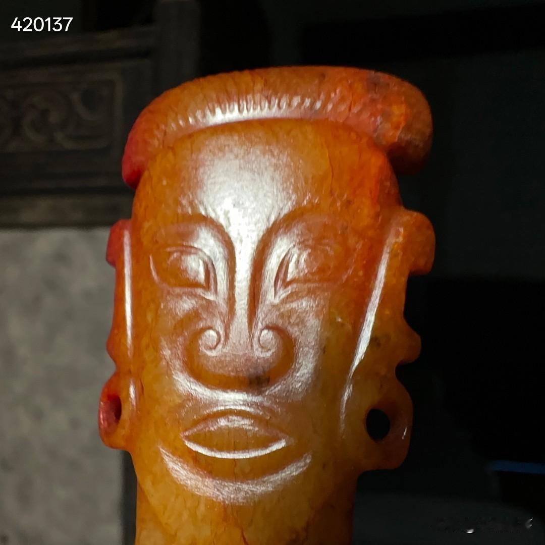 文化期神人面