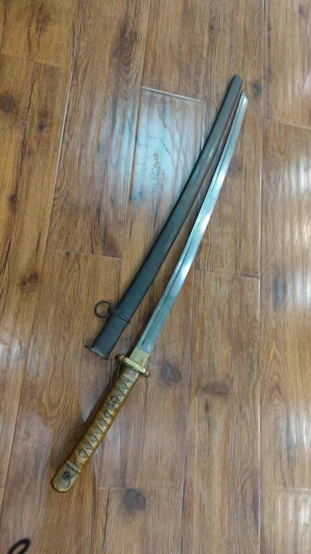 本馆藏品：侵华日军实物罪证之95式铜柄