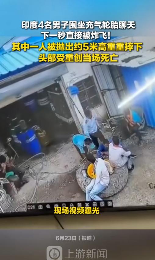 “论安全生产的重要性！”6月23日报道，印度，一家修理行里，技工正在给挖掘机轮胎
