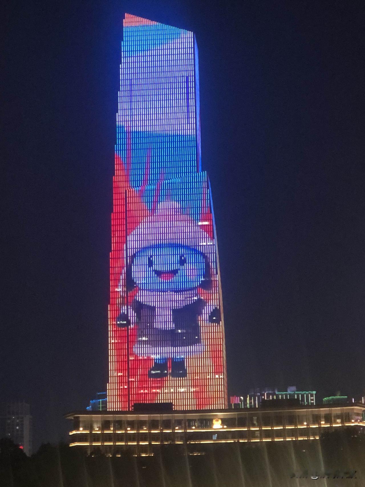 七绝·江滩新虹

 武汉江滩灯光秀历经暴雨损毁，抢修重启后更显璀璨夺目。正如人生