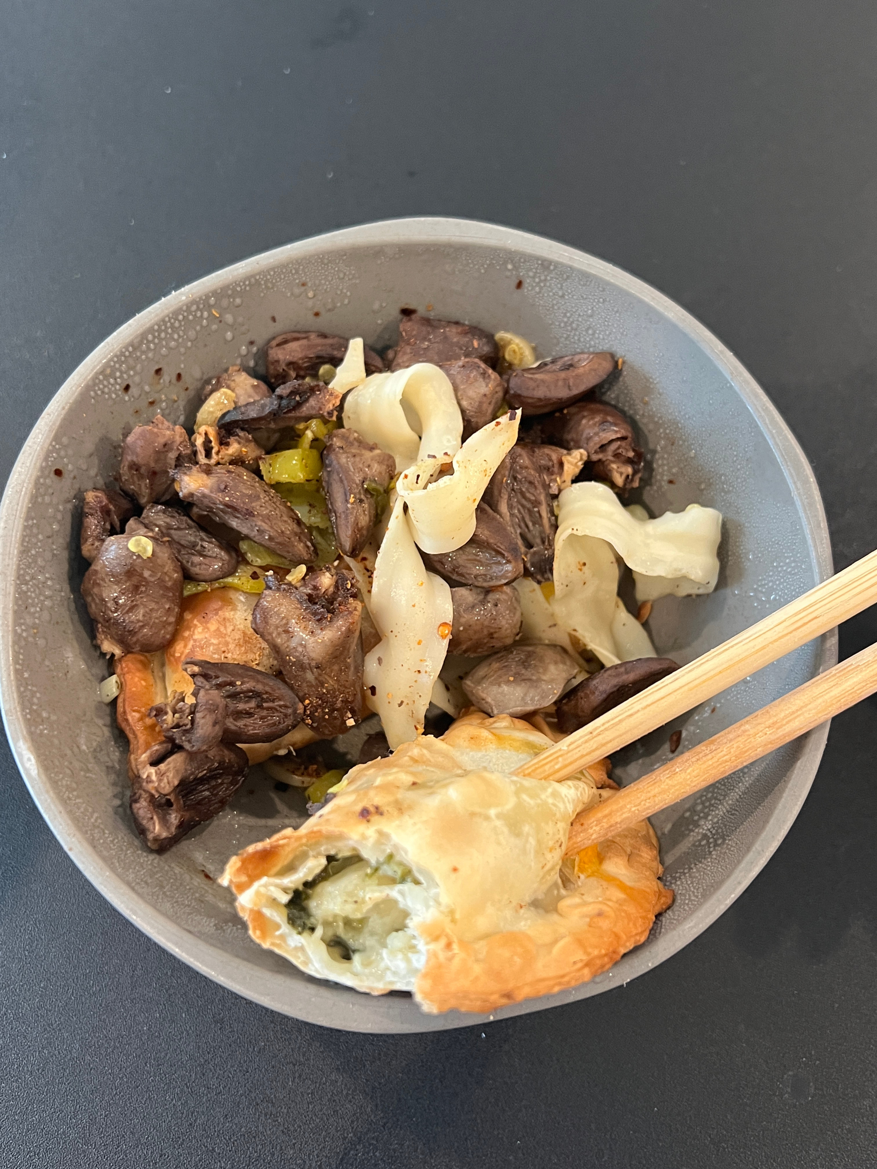 Weirdest lunch ever烤鸡心刀削面盖浇empanadas ​​​