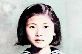 1956年，国民党员丁窈窕押赴刑场时，给她拍下了这张照片，她不是战斗英雄，被捕只