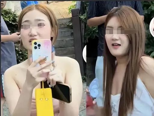山东青岛海边景区。
一孕妇爬台阶，挡住了后面拍照的女大学生。男摄影师催孕妇快点走