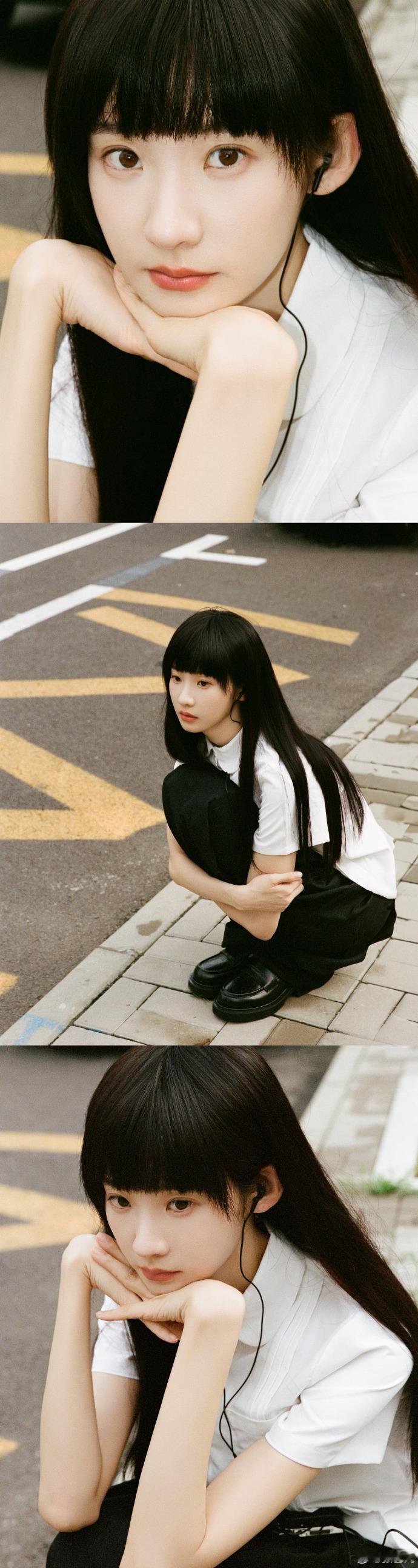 张艺凡以黑长直齐刘海造型亮相，“耳机分你一半” 的设定传递治愈力量，发型凸显纯净