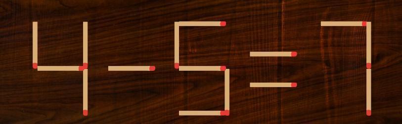 木质桌面上，几根火柴错落有致地拼出了一道等式：“4 - 5 = 7”。只需扫一眼
