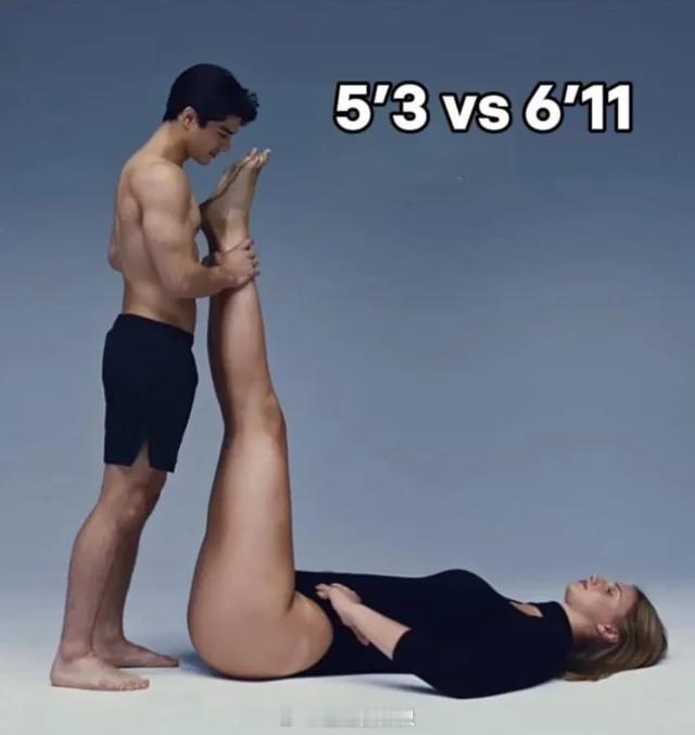 一个1米6（5英尺3英寸）的男人，站在2米1（6英尺11英寸）的排球运动员安娜·