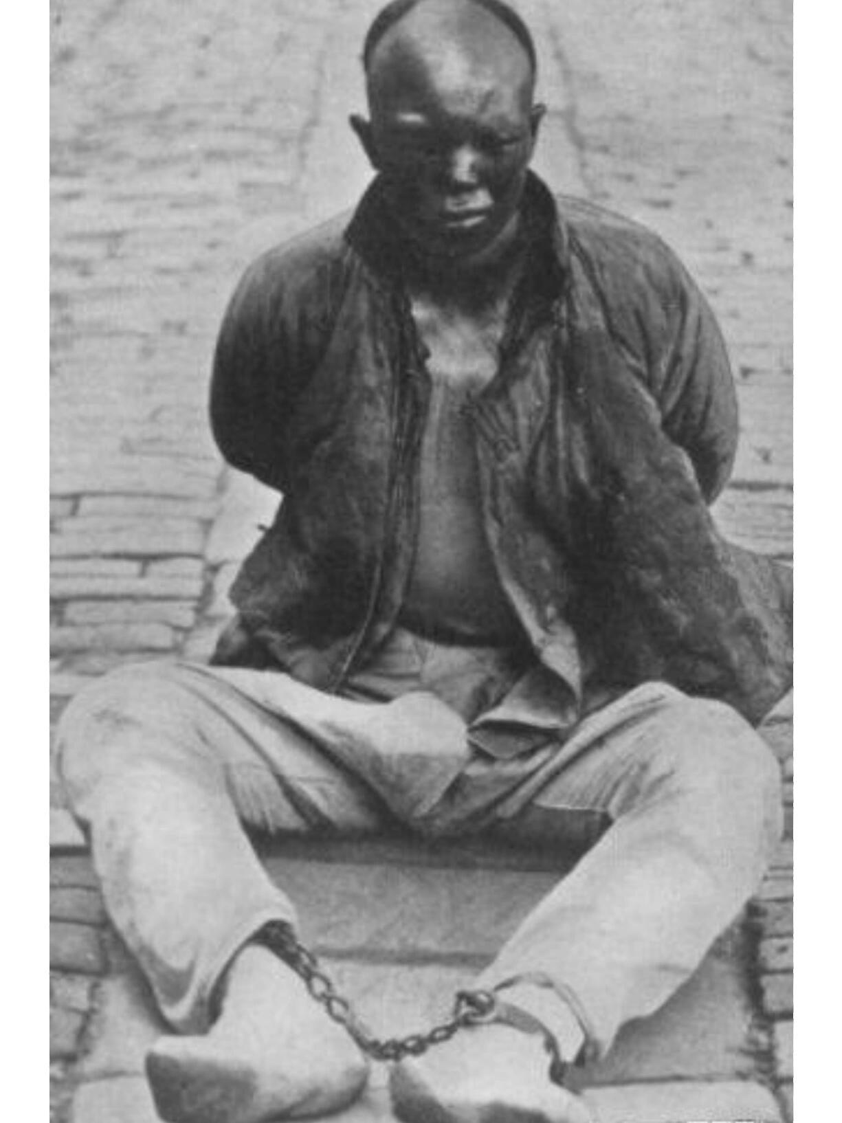 历史知识1911年，被清军斩首的革命党人，杨洪胜就义前的一张珍贵的老照片。照片中