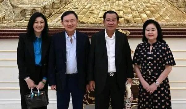 他信英拉和洪森夫妇合影，他信英拉祖籍广东梅州人，洪森祖籍广东潮州人，洪森夫人祖籍