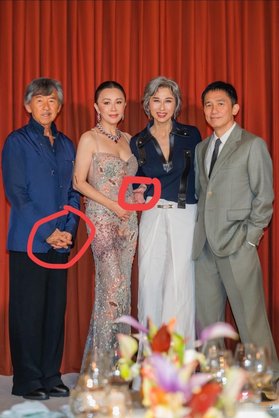 瞧，梁朝伟的手绕过叶倩文的腰，想要抓刘嘉玲的胳膊吗？

倒是林子祥表现得中规中矩