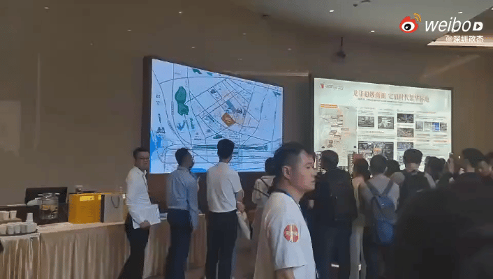 龙华尚云府火爆销售，外地购房团包机来看房。说是北京的看房团下飞机后背着包就过来看