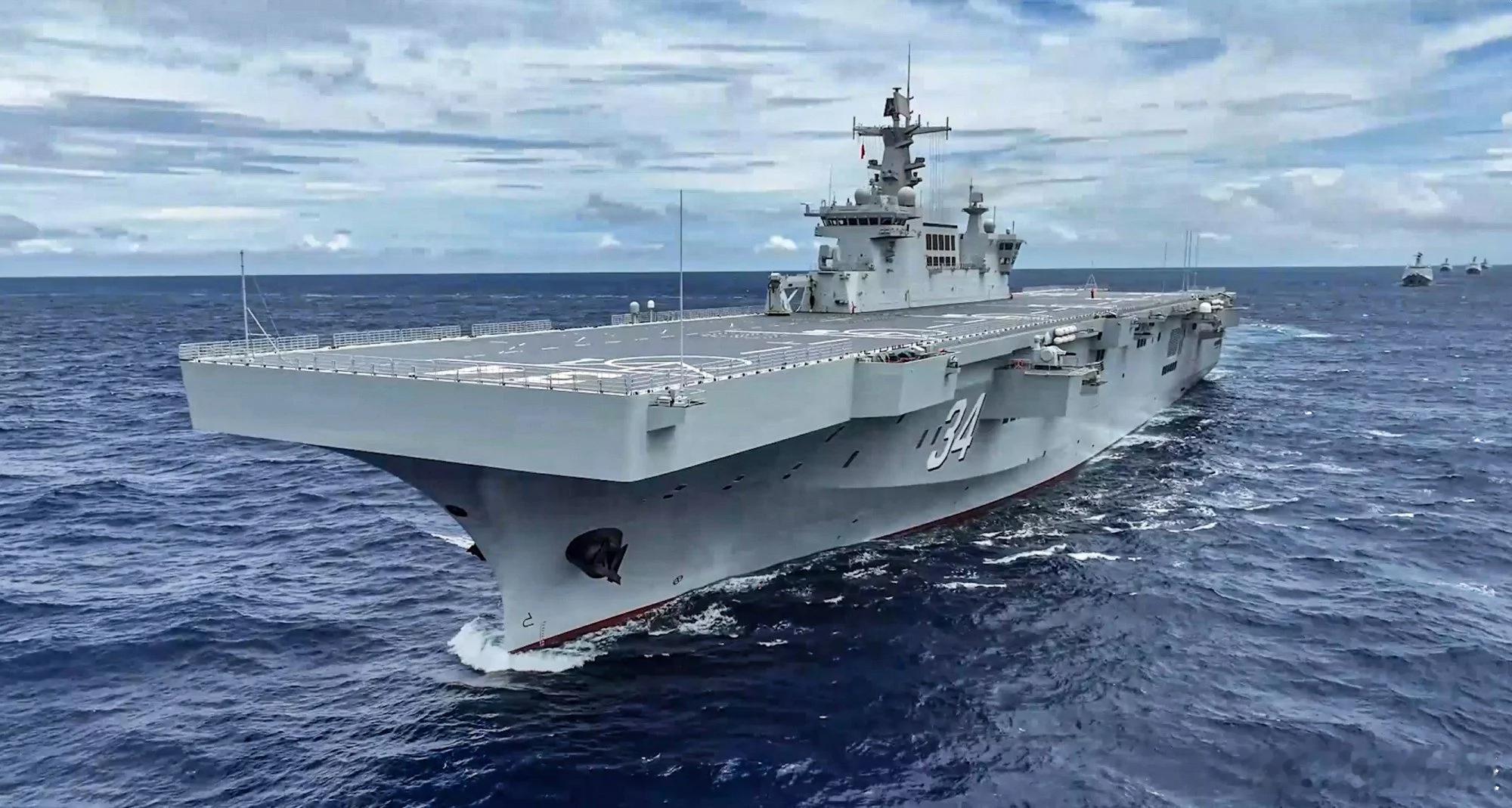 【澳大利亚高度戒备，中国人民解放军海军舰队在菲律宾海向南航行】[澳大利亚正不可避