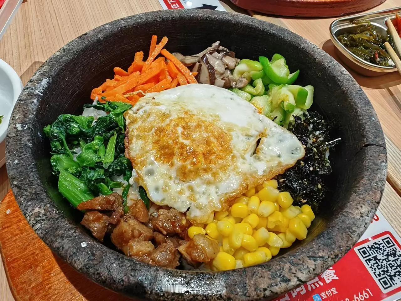 济南美食：石锅拌饭、石锅豆腐。（韩联社）
石锅菜拌饭 拌饭石锅拌饭 石锅蟹粉拌饭