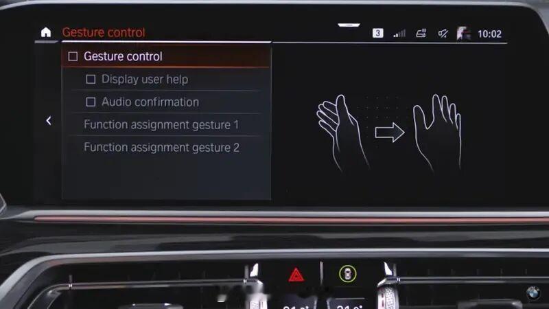 宝马从15年开始用的手势控制取消了10年也算是人机交互的过渡形式当年习惯画圈圈调