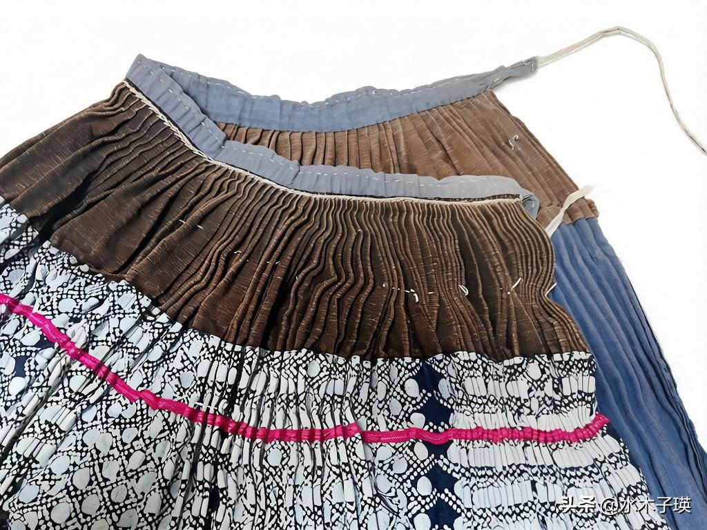 别人都爱买新衣，上海姑娘M却花几百块，淘了条又旧又小的苗族老裙子，腰围只有1尺8