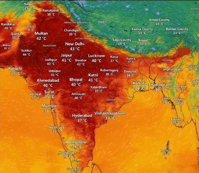 51℃“烤”验印度：这场高温，是天灾更是人祸印度北部被象征致命高温的深紫色彻底覆