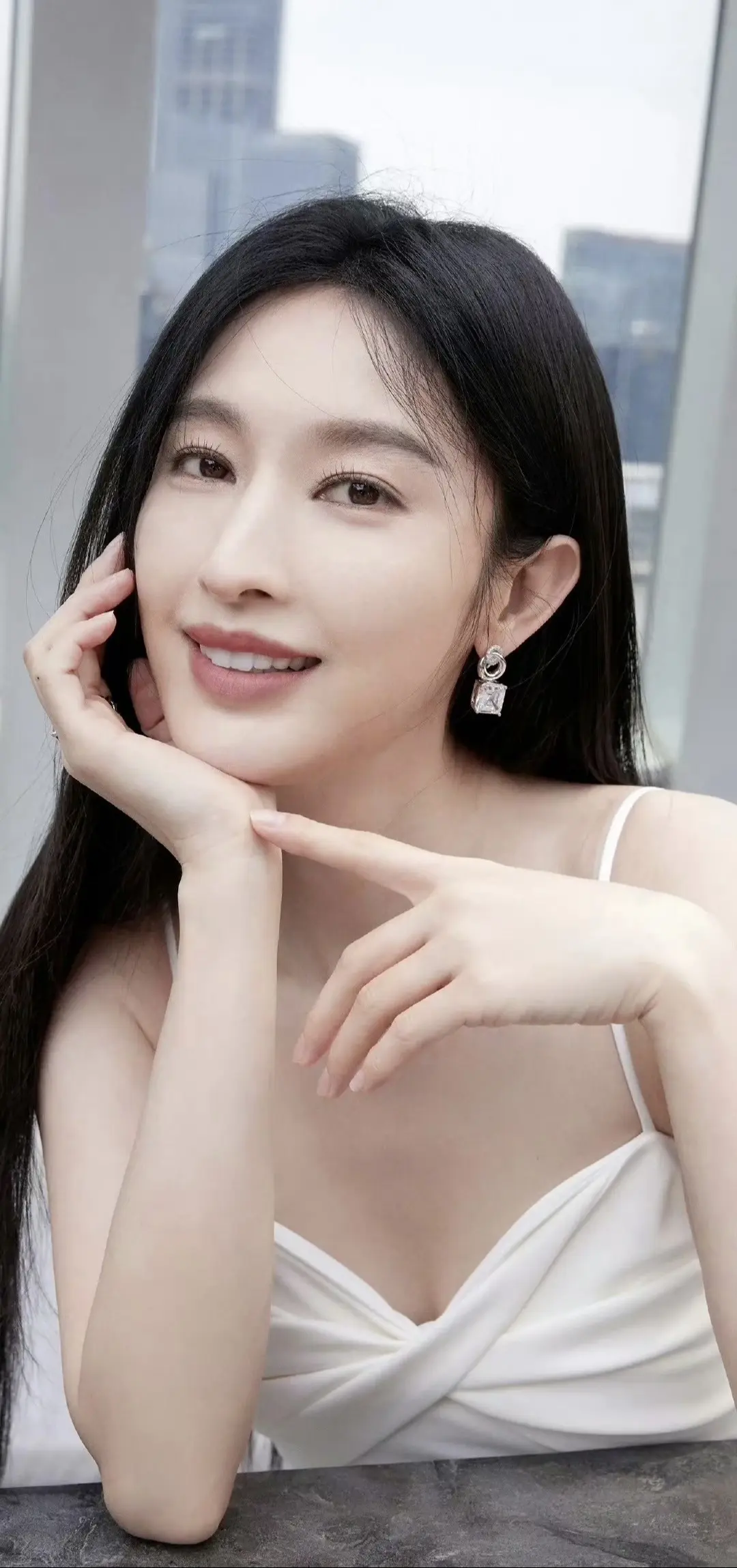 张俪。