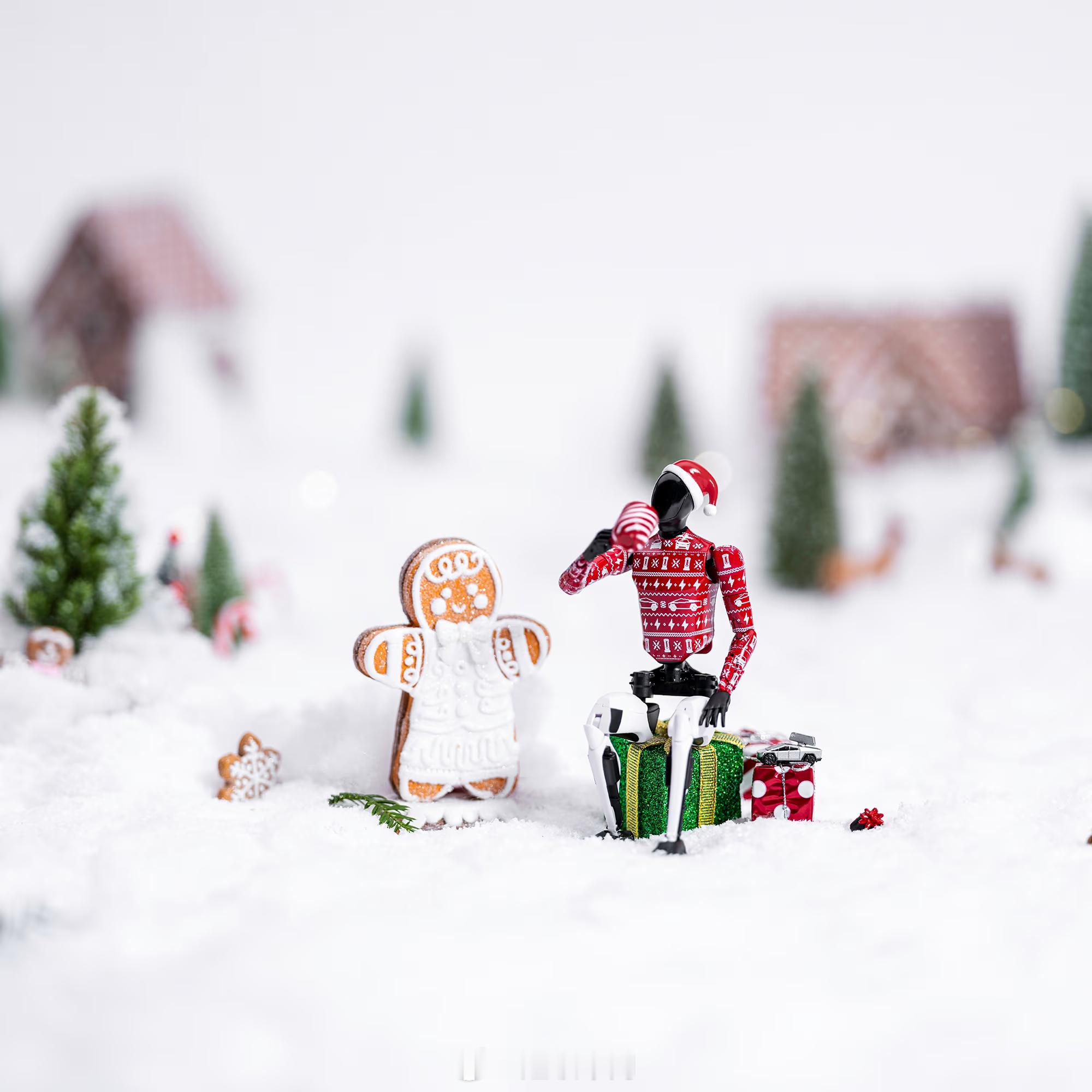 特斯拉圣诞款摆件，本周五 10:00 开售，套装包含：1 个机器人可动人偶1 个